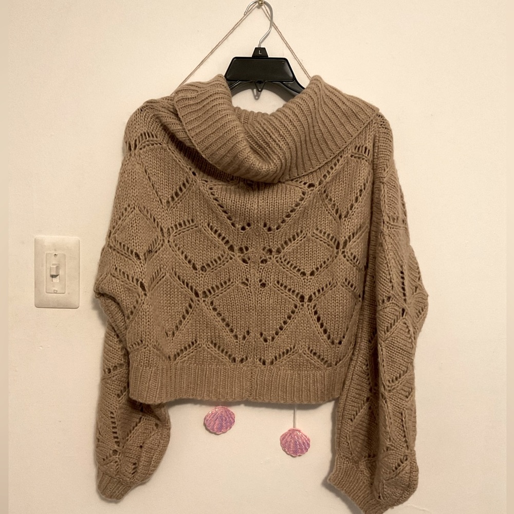 Tan turtleneck off the shoulder sweater